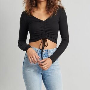 Black Garage ruched long sleeve crop top